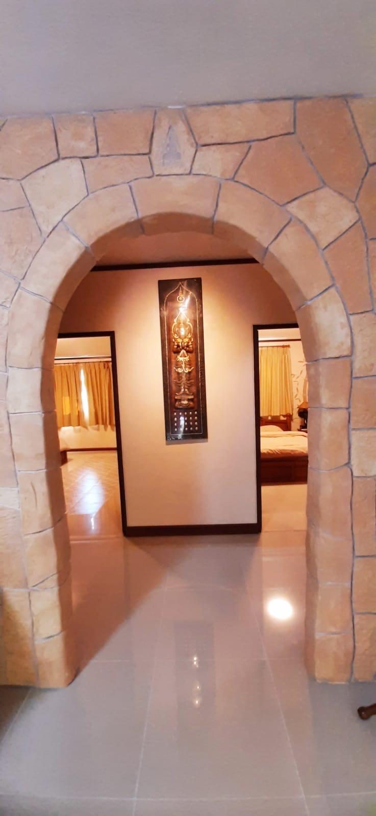 Traditional stone arch inside ground floor apartment
